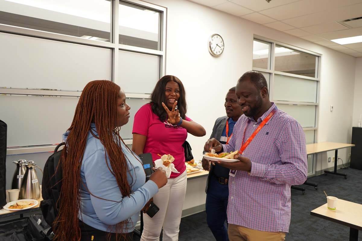 group of conference attendees engaged in a networking session